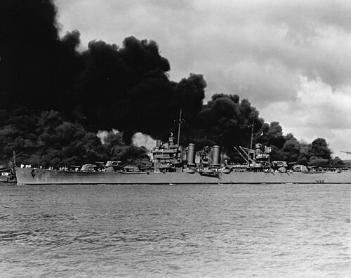 USS Phoenix steaming down the channel at Pearl Harbor on December 7, 1941